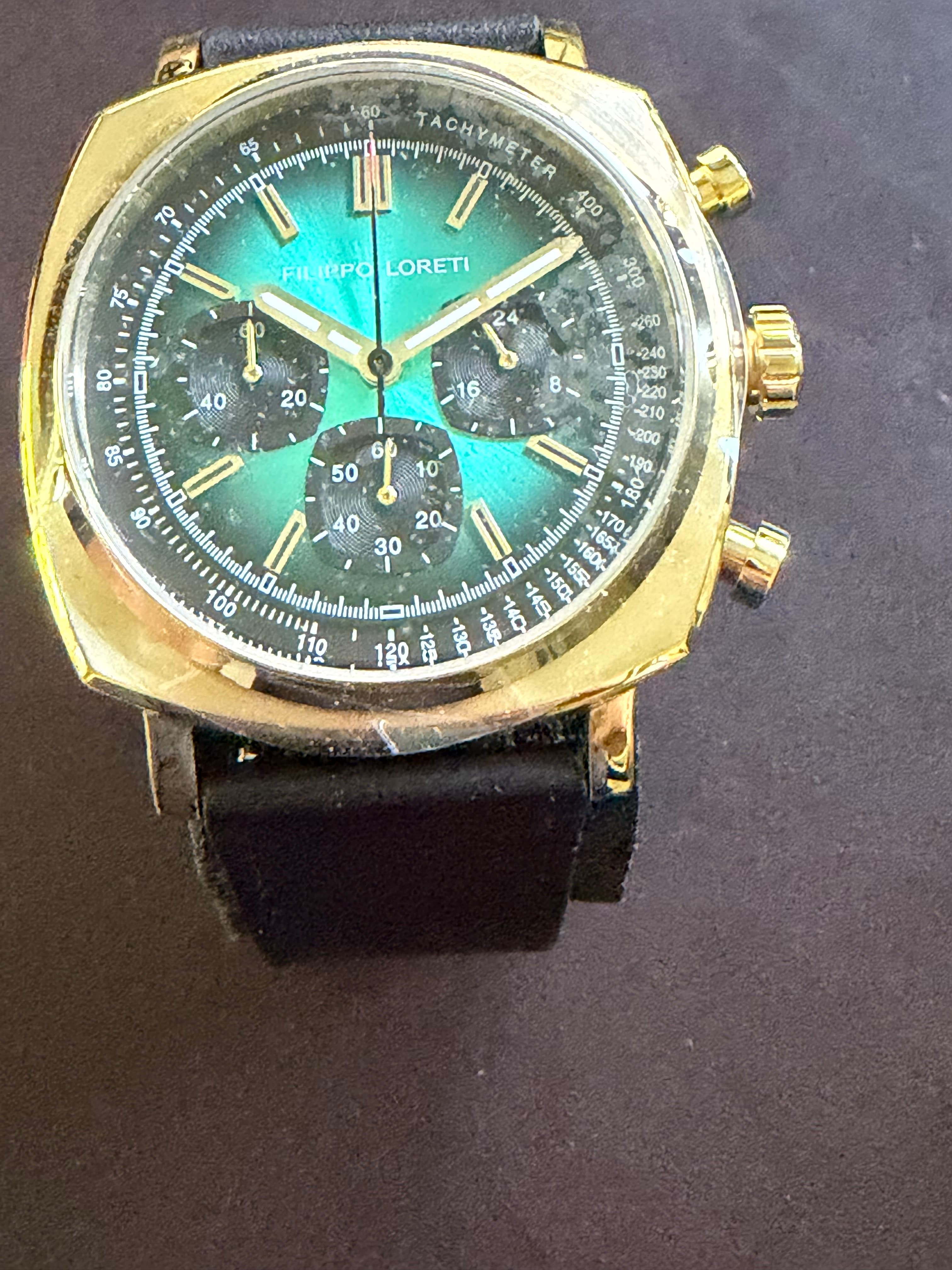 Filippo Loreti Retro Chrono Verde three-quarter view showing case and pushers